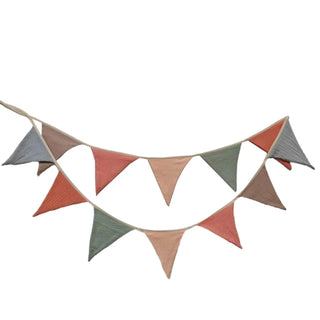 Handcrafted cotton flag bunting banner in pastel colours as nursery or party decoration.