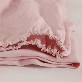 Pink pure linen fitted sheet — breathable natural linen bedding, textured and soft, ideal for year-round comfort. Available in multiple colours and sizes at Arkaim Home. Perfect for modern, boho, Scandinavian, and wabi-sabi bedroom styles.