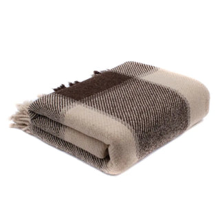 Virgin wool blanket with fine plaid pattern in cream and brown.