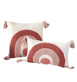 Tufted cotton cushion cover with pastel rainbow design and hand-tied tassels - perfect for children’s nursery or playroom.