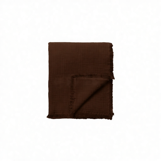 Chocolate brown fringed cotton throw for layering on beds, sofas or armchairs.