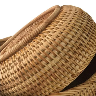 Set of round handwoven natural rattan storage baskets in three sizes, ideal for organising or serving snacks in an eco-friendly home.
