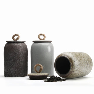 Rustic Japanese ceramic canisters with natural rope detail for storing tea, coffee, sugar and spices.
