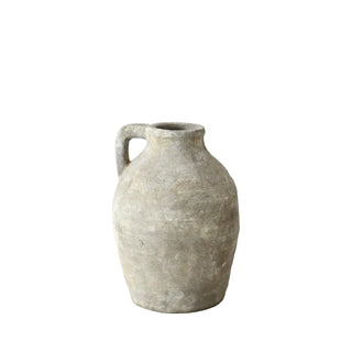 Rustic terracotta jug with a matte texture and loop handle.