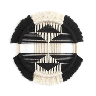 Safiya handwoven macrame wall art – a natural boho wall decor piece perfect for adding contrast, texture and interest to any space. Crafted from eco-friendly materials, this stylish wall hanging enhances modern, rustic, and Scandinavian interiors. Ideal for gallery walls, living rooms, or entryways.