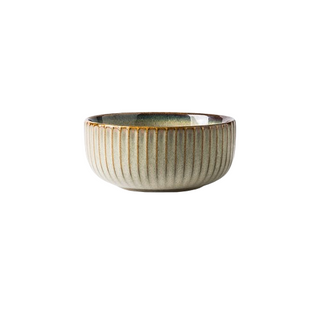 Kiln-glazed ceramic bowl with ribbed surface and earthy, neutral tones inspired by sand and sea—ideal for serving rice, noodles, or shared meals.