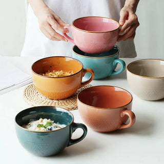 Large ceramic mugs in bright colours and with dotted pattern - ideal for serving coffee, tea, soup, or cereal.