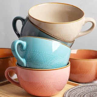 Large ceramic mugs in bright colours and with dotted pattern - ideal for serving coffee, tea, soup, or cereal.