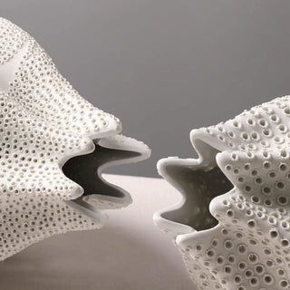 Sango handmade coral-inspired ceramic vase with perforations.