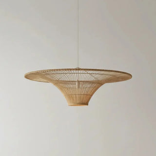 Natural handwoven rattan pendant light with a sculptural funnel silhouette and airy woven texture.
