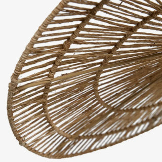 Organic handwoven jute pendant light in natural tone, featuring sculptural shape and artisanal texture — perfect for wabi-sabi or boho interiors.