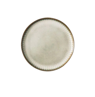 Artisanal ceramic Goku dinner plates, crafted using traditional kiln-glazed methods with a ribbed surface and finished in calming neutral hues inspired by sand and sea. These versatile plates adds a touch of elegance to dinner parties and summer socializing.