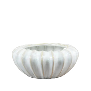 Decorative ceramic vase with rounded organic silhouette.
