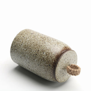 Textured rustic ceramic storage jar for tea and coffee.
