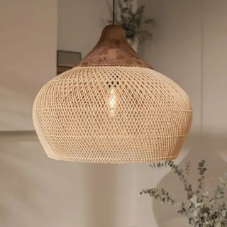 Natural rattan and teak pendant light with bell shape — handmade ceiling lamp for minimalist, boho or coastal interiors.