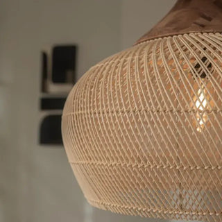 Natural rattan and teak pendant light with bell shape — handmade ceiling lamp for minimalist, boho or coastal interiors.