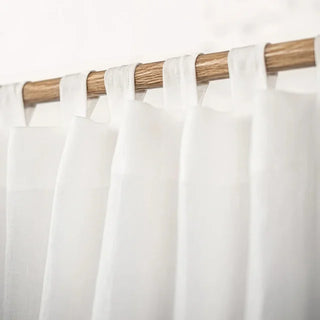 White tab top pre-washed linen curtain panel — pure linen window curtain with soft drape and textured finish. Ideal for earthy, minimalist, and Scandi-inspired natural home décor. Available at Arkaim Home.