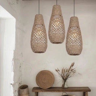 Handwoven seagrass pendant light with teardrop shape - perfect for wabi sabi, contemporary, minimalist decor.