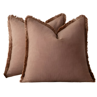 Terracotta fringed cotton cushion covers, made from 100% natural cotton for a soft and breathable feel. Featuring elegant ruffled edges, these timeless cushion covers are available in two sizes for flexible styling in any home décor.
