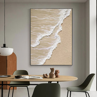 Beige and white textured canvas wall art inspired by ocean shores in a modern dining room setting.