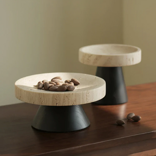 Elegant round pedestal display tray crafted from travertine and cedar wood, featuring a high foot stand for a sophisticated touch. Perfect for natural home décor, this versatile tray is ideal for showcasing ornaments, candles, or serving essentials with organic beauty