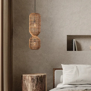 Handwoven Twister Abaca Pendant Light with open-bottom fish trap design and natural bark weave—artisan lighting with a coastal touch.