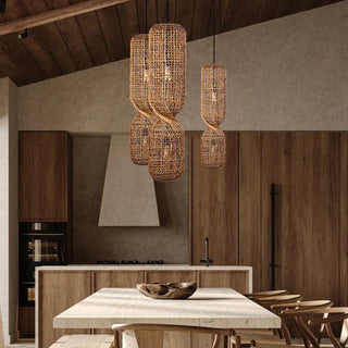 Handwoven Twister Abaca Pendant Light with open-bottom fish trap design and natural bark weave—artisan lighting with a coastal touch.