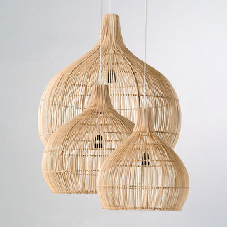 Handcrafted bamboo pendant light with tulip shape and neutral finish, ideal for boho and minimalist interiors.