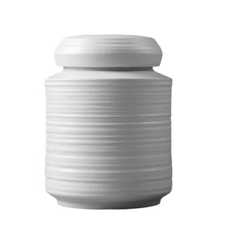Elegant white ceramic storage jars in various shapes and sizes, featuring a ribbed textured finish and airtight lids. Perfect for storing tea, coffee, sugar, and spices while adding a modern, sophisticated touch to any kitchen countertop.