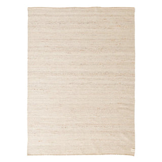 Anvi handmade wool and linen rug in beige earthy tones, featuring a bubbly textured surface - ideal for Scandi, minimalist, or modern interiors.