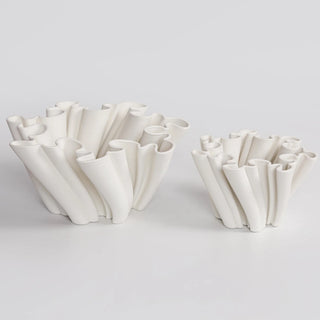 Fluted decorative white ceramic centrepieces for minimalist interiors.