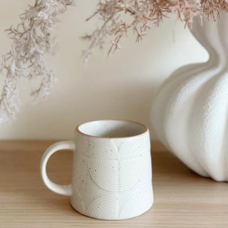 Textured white ceramic tea mug Arkaim Home in Scandi kitchen