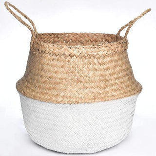 Handwoven natural and white seagrass storage basket with handles, perfect as a stylish hanging basket, pot planter, or decorative storage solution. This eco-friendly, two-tone basket adds a touch of natural home décor while keeping your space organized. Shop handcrafted storage baskets at our natural homeware store.