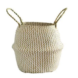 Handwoven natural and white seagrass storage basket with handles, perfect as a stylish hanging basket, pot planter, or decorative storage solution. This eco-friendly, two-tone basket adds a touch of natural boho touch while keeping your space organized. Shop handcrafted storage baskets at our natural homeware store.