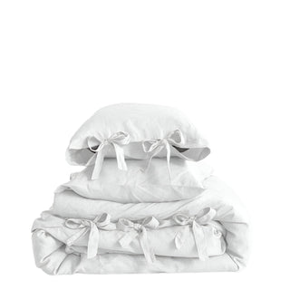 Pure stone washed 3 pcs linen bedding set with ribbon tie closure in white – available in multiple colours and sizes from Arkaim Home. Perfect for a modern, Boho, Nordic or coastal bedroom styling. 