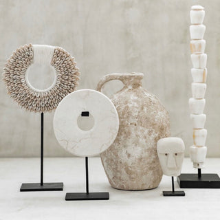 A stunning Marble Disc Ornament carved from elegant whte marble, featuring a polished, unique disc displayed on a sleek metal frame. This sophisticated home décor piece adds a touch of luxury to any space, perfect for side tables or consoles. Ideal for creating a stylish focal point, it enhances interiors with its elegant design and timeless appeal. A beautiful addition to modern, minimalist, or contemporary décor.