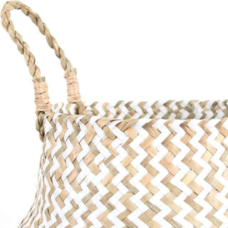 Handwoven natural and white seagrass storage basket with handles, perfect as a stylish hanging basket, pot planter, or decorative storage solution. This eco-friendly, two-tone basket adds a touch of natural boho touch while keeping your space organized. Shop handcrafted storage baskets at our natural homeware store.