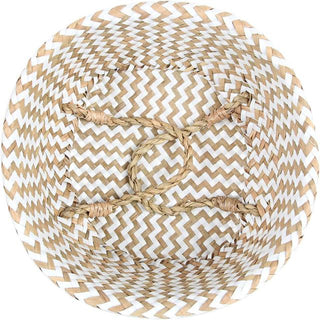 Handwoven natural and white seagrass storage basket with handles, perfect as a stylish hanging basket, pot planter, or decorative storage solution. This eco-friendly, two-tone basket adds a touch of natural boho touch while keeping your space organized. Shop handcrafted storage baskets at our natural homeware store.