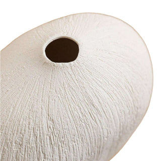 White textured ceramic vase with a minimalist design, available in two colours that can be styled together. The vase features a creative, organic pebble shape and a sleek white matte finish, perfect for adding a bold, statement look to any modern or contemporary interior.