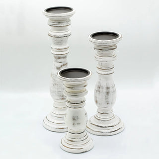Set of three distressed white mango wood candle holders for rustic, coastal, or boho home décor.