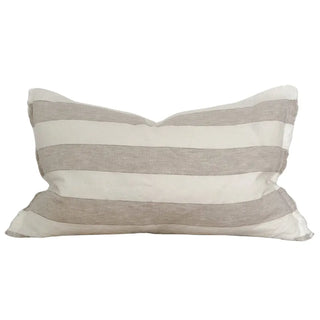 Striped linen cushion with freyed edges for relaxed, organic interiors.