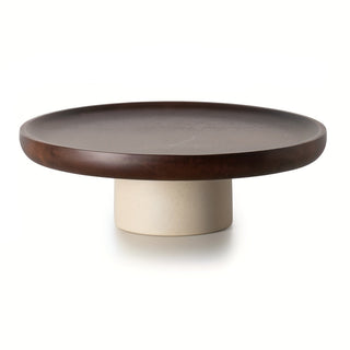 Round wooden cake stand with ceramic base for displaying cakes, muffins or fruits.