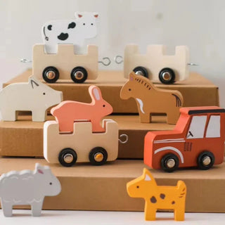 Wooden Montessori farmyard pull-along toy with animal figures and nesting shapes, designed for toddler learning and play.