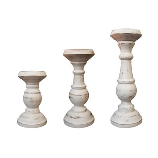 Rustic wooden candle holder crafted from solid mango wood with a distressed paint effect, perfect for adding natural charm to your home décor. Ideal for shelves, mantles, or coffee tables, this candle holder enhances the atmosphere of cosy evenings. Fitted with a metal candle plate, it can accommodate votive or pillar candles. Whether used alone or in a grouped centrepiece, this wooden candle holder creates a sophisticated, ambient glow with candlelight