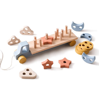 Wooden Montessori truck and trailer shape puzzle toy with removable blocks, designed for toddler learning and sensory play.