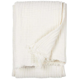 White muslin cotton  throw for bed or sofa styling.